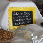 Wedding treat sign for wedding favors at outdoor maryland wedding at morningside inn. chalk board says "take a little or take a lot We tied the knot"