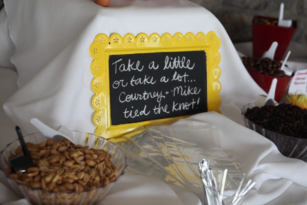 Wedding treat sign for wedding favors at outdoor maryland wedding at morningside inn. chalk board says "take a little or take a lot We tied the knot"