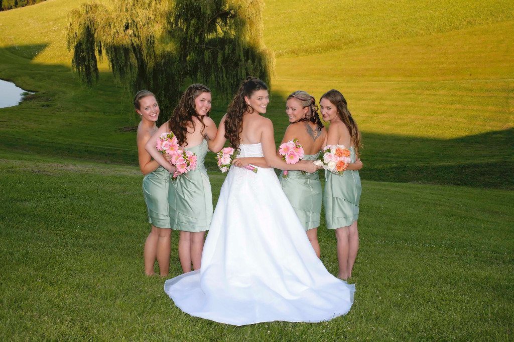 Maryland wedding site with bride and bridesmaids by pond