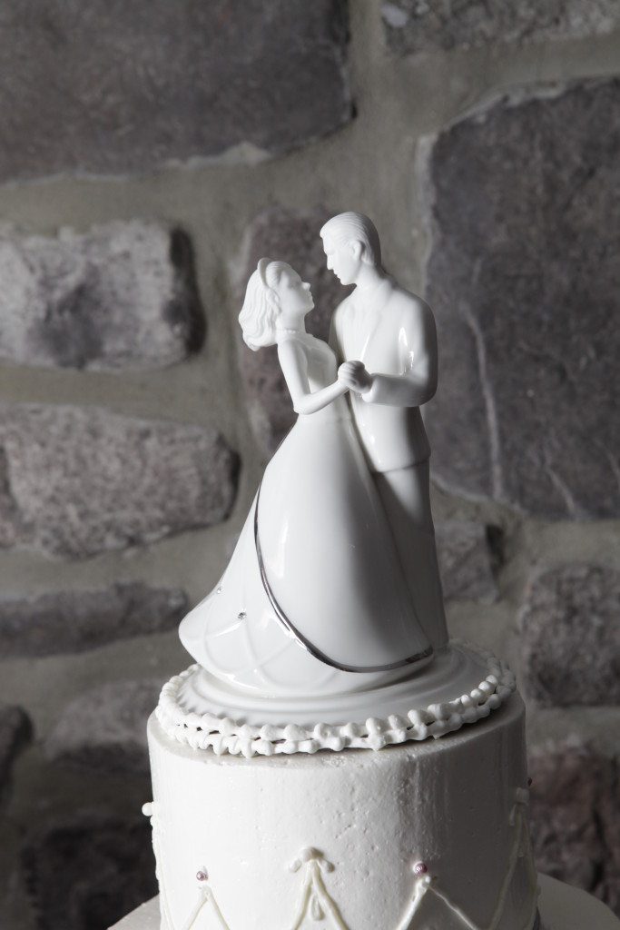 Wedding cake topper with bride and groom dancing white ceramic