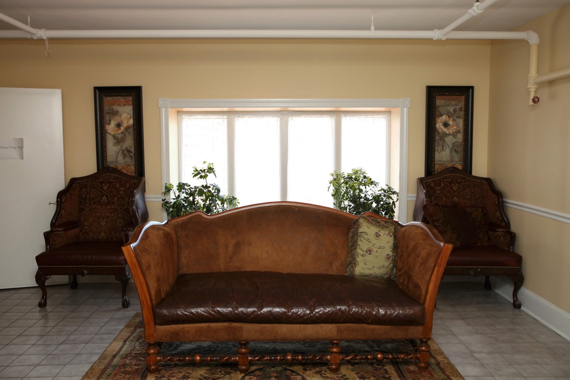 Brides room single leather couch