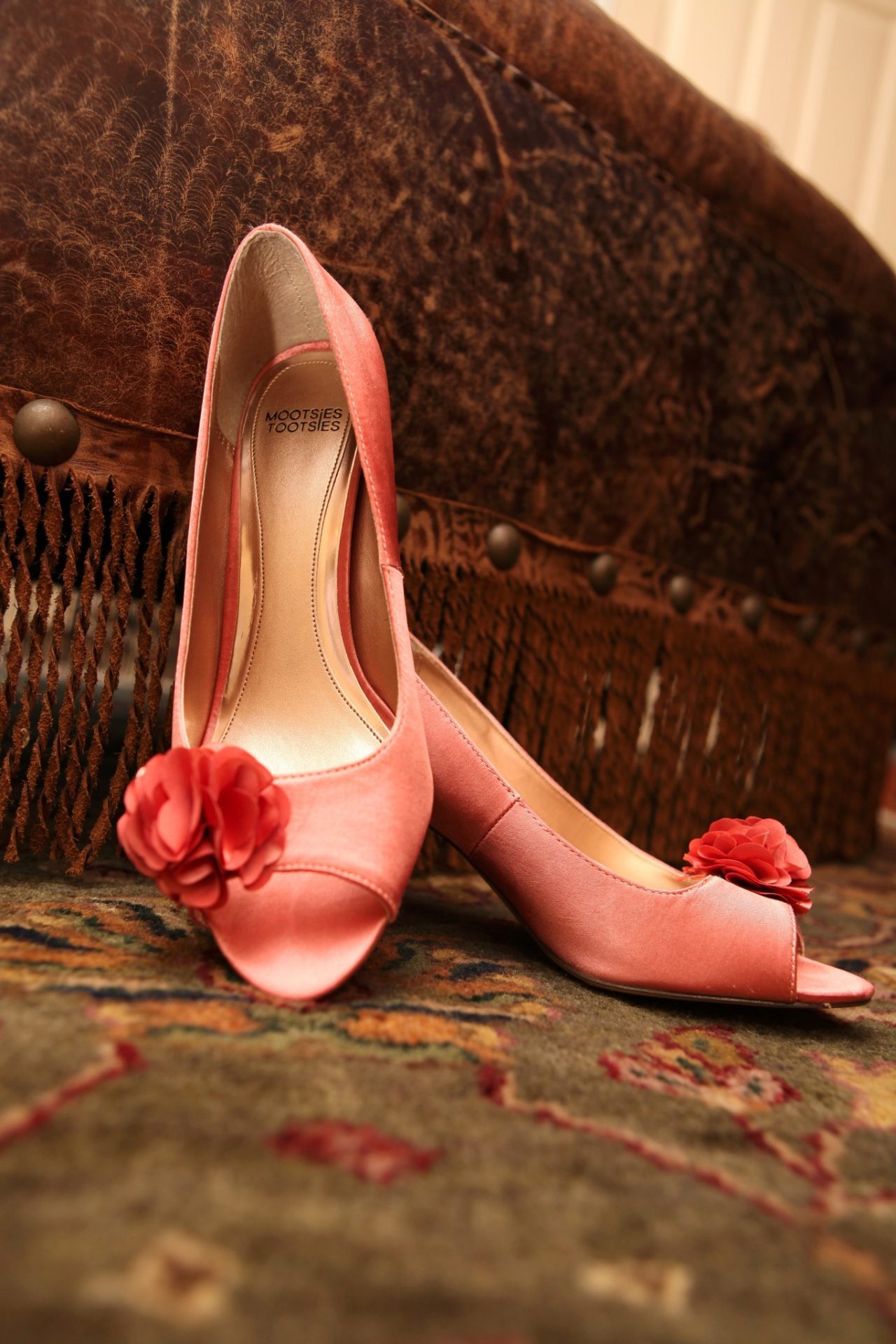 Reception brides pink shoes