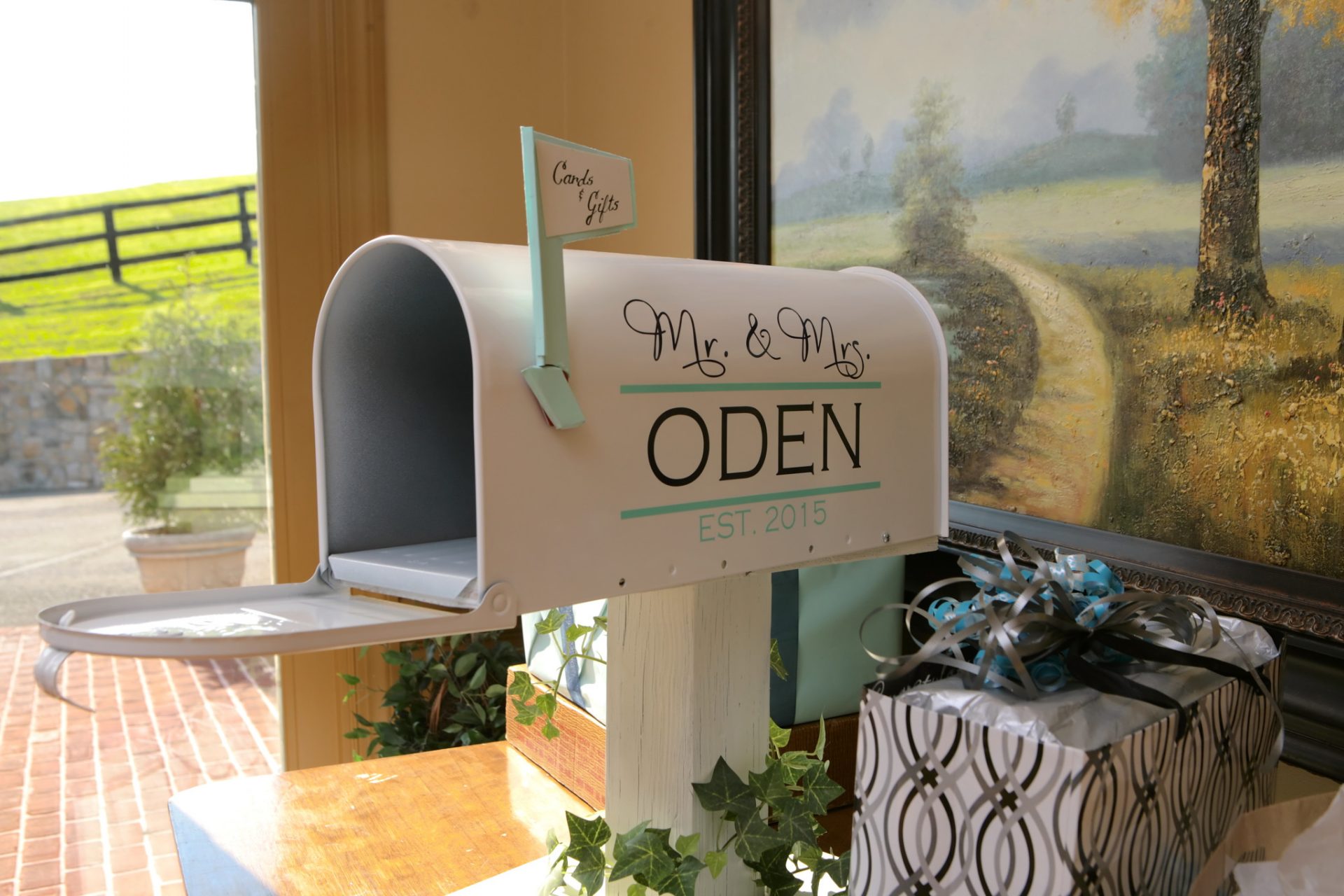 wedding message mailbox painted white with Mr. and Mrs Oden painted on side