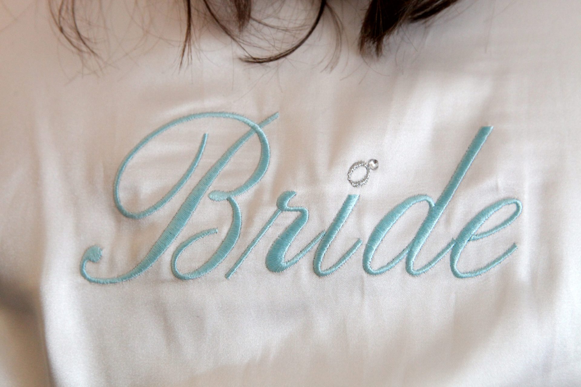 Bride's robe with embroidered "bride" on the back