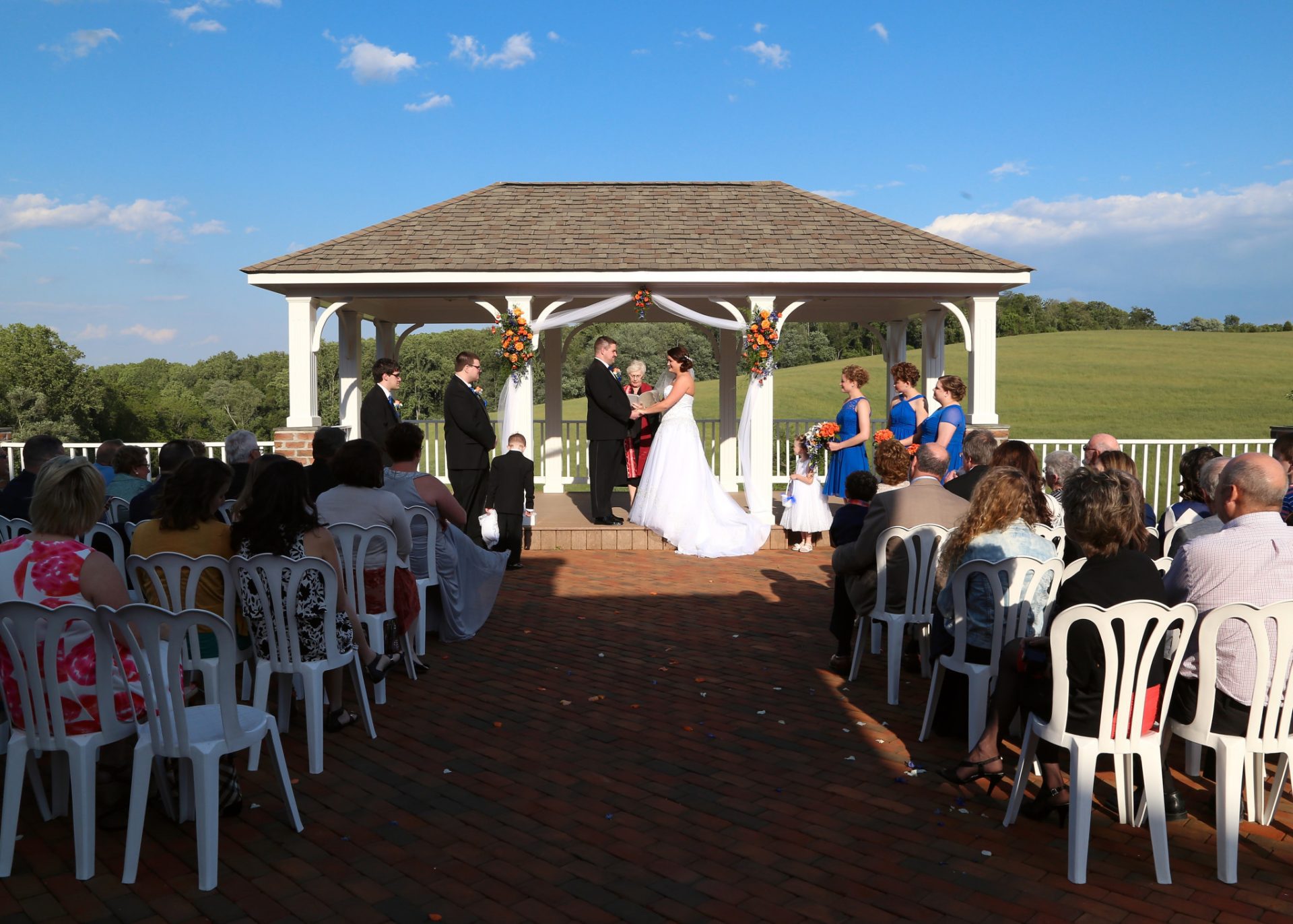 Outdoor wedding in Maryland on brick patio and pavilion
