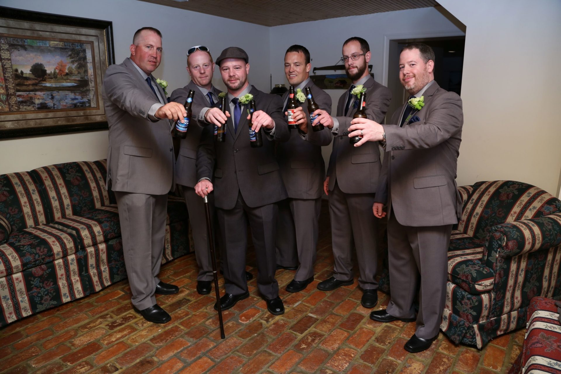 Celebrating in the groom's room before Maryland wedding
