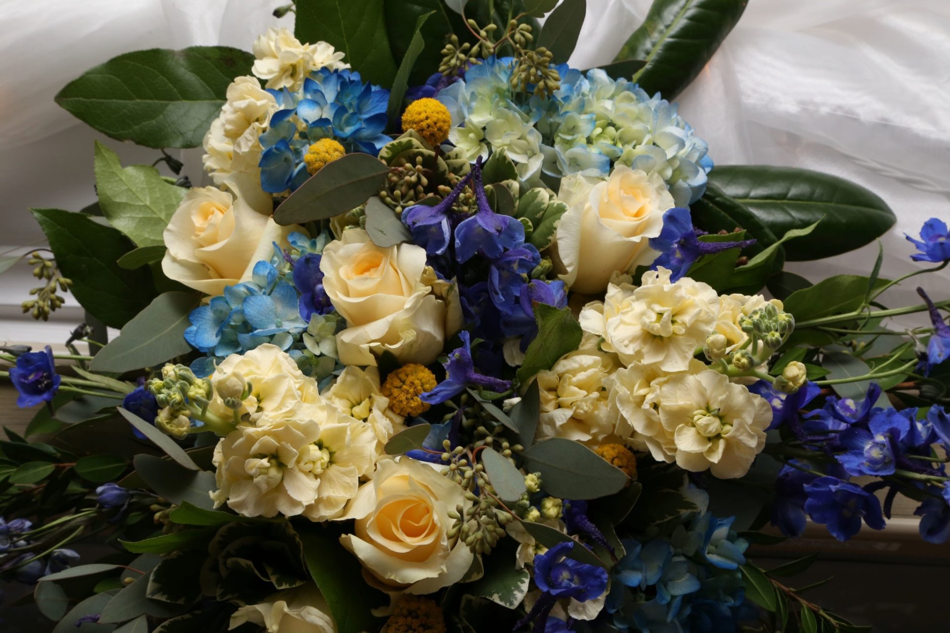 Yellow, blue and purple wedding flowers