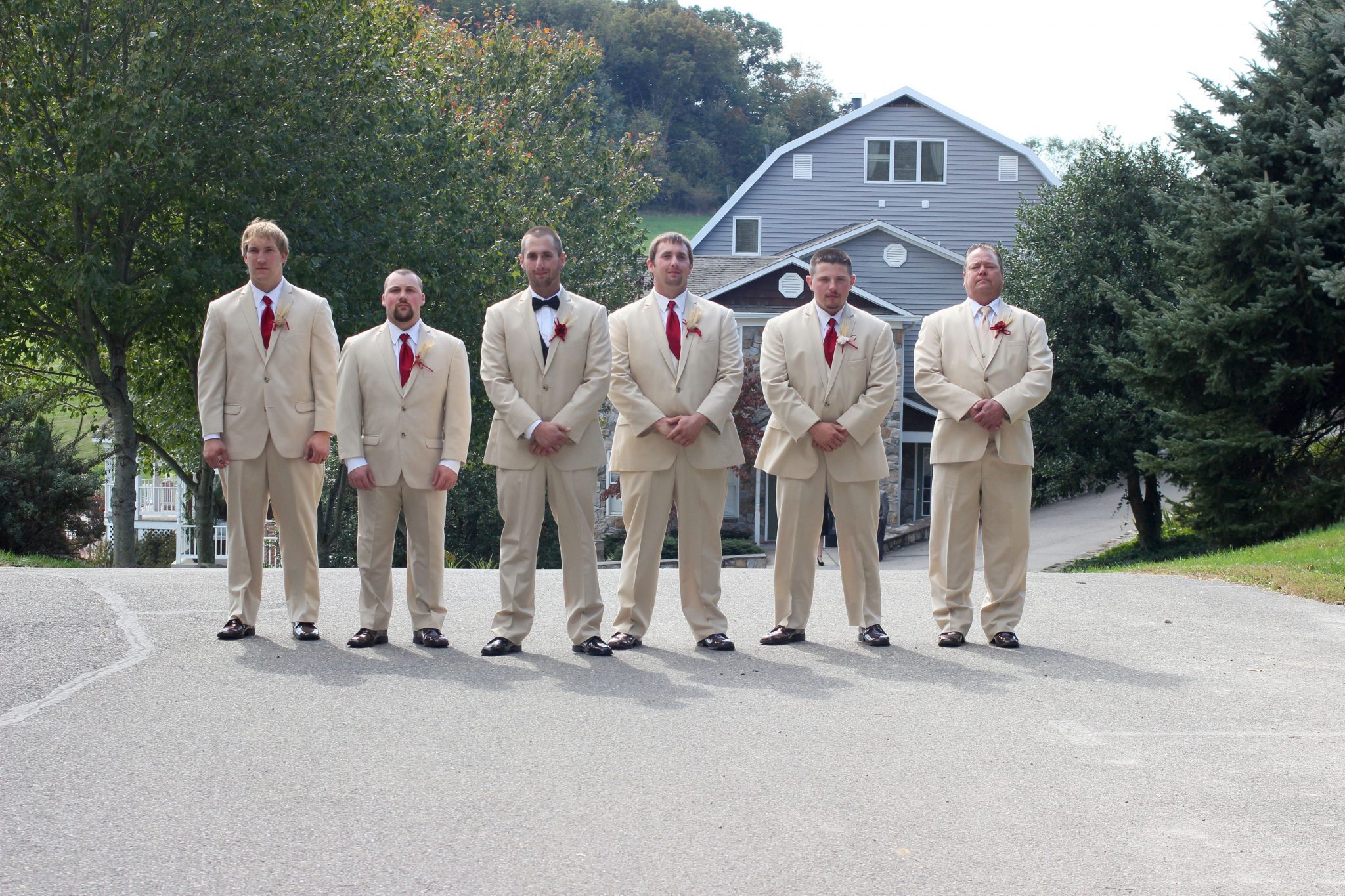 The boys pose on driveway of Morningside Inn and still remain out of site of bride before the fall wedding ceremony and reception
