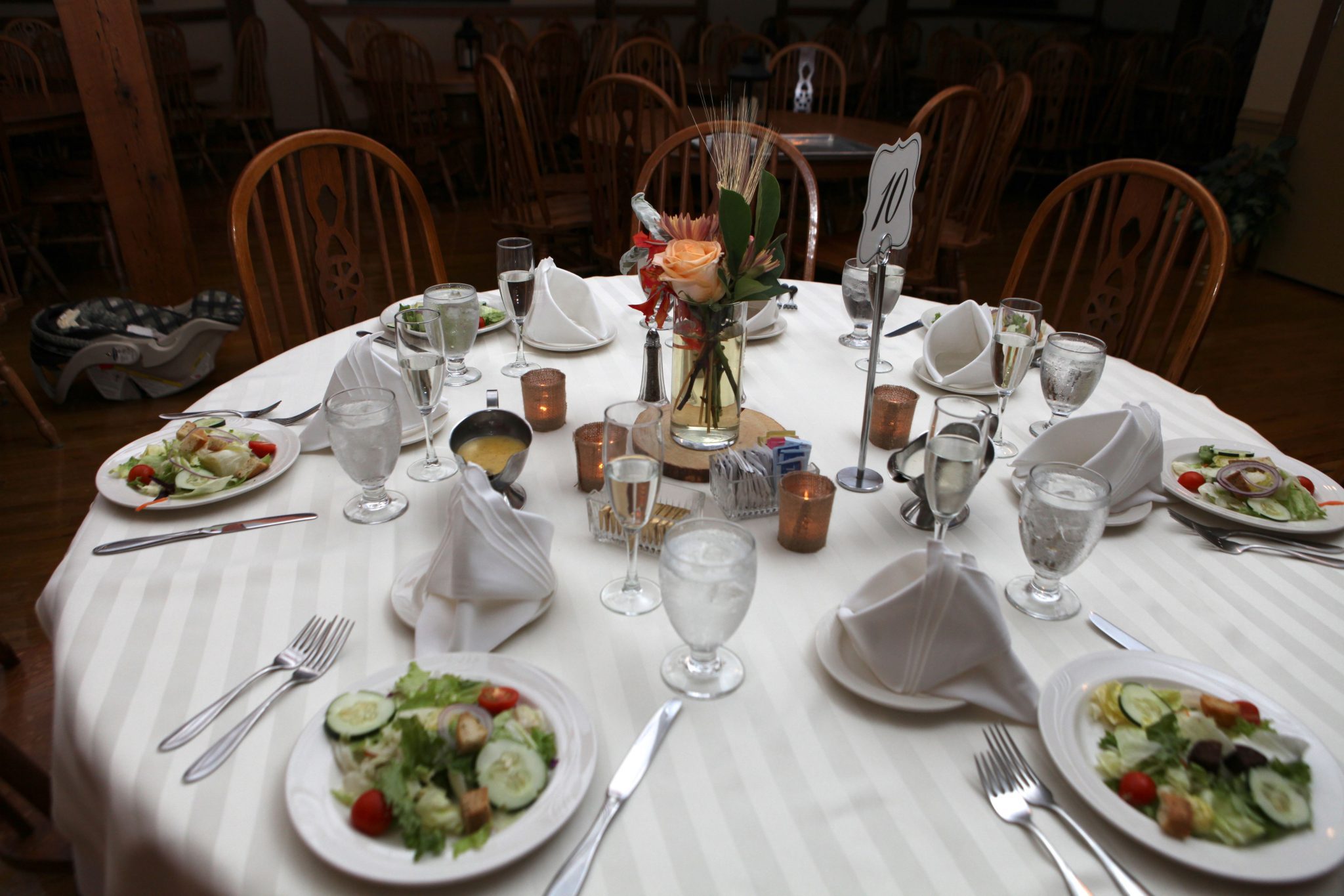 Dinner table setting for wedding in white