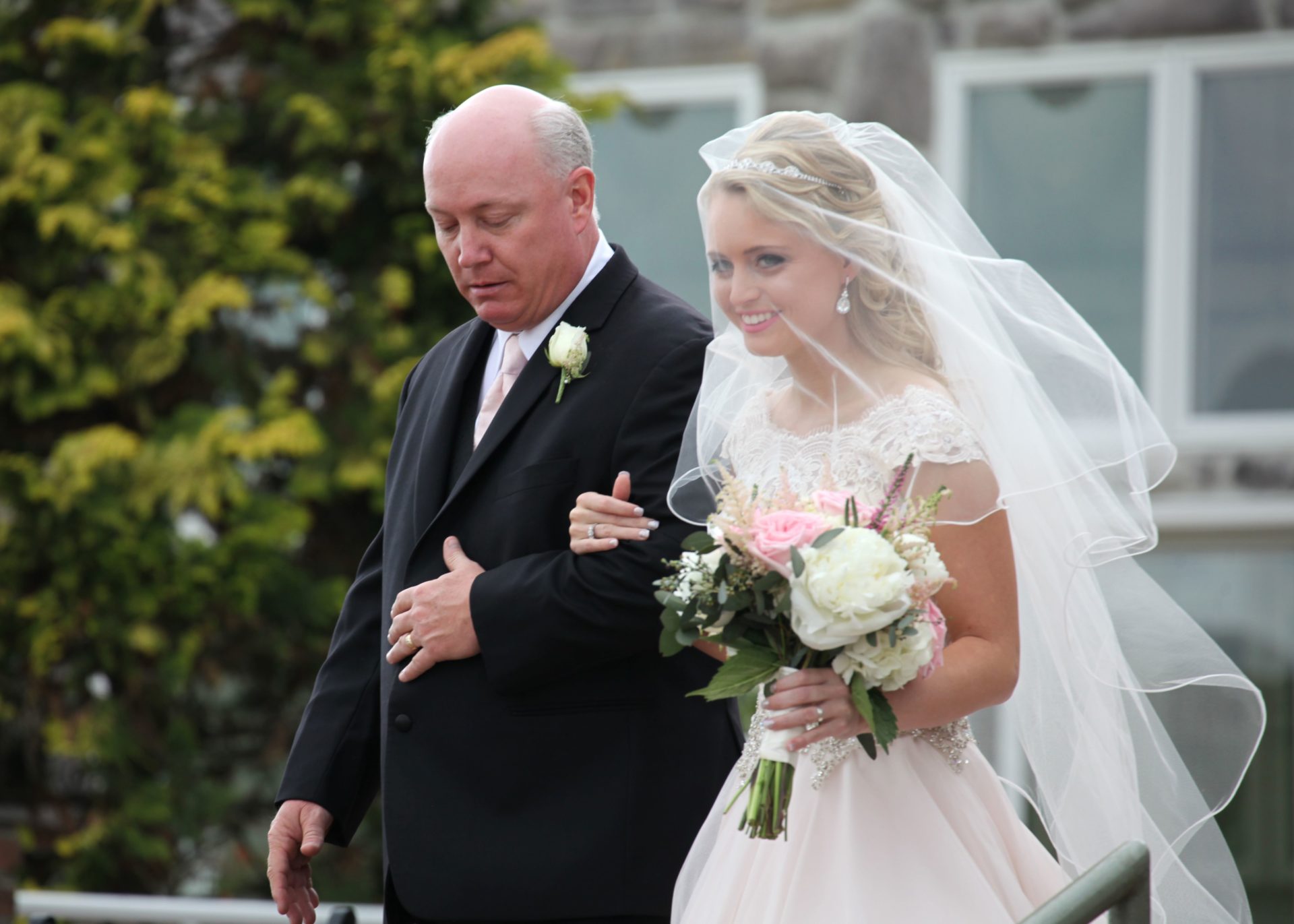 Father of the bride walks bride down aisle at outdoor wedding ceremony in Frederick at Morningside Inn