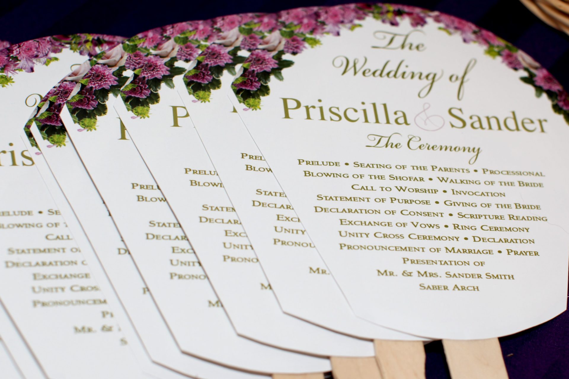 Wedding programs and fans for outdoor wedding during tea party theme wedding