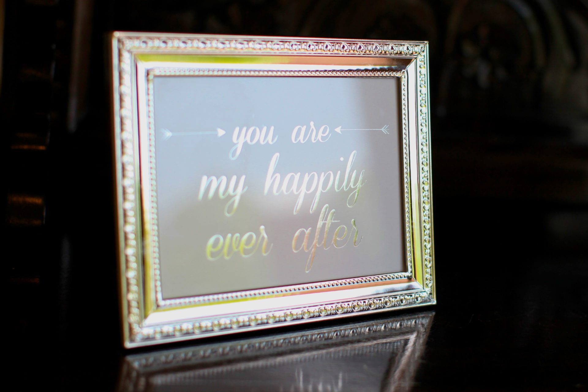 Frames decorated the wedding with love quotes such as You are my happily ever after