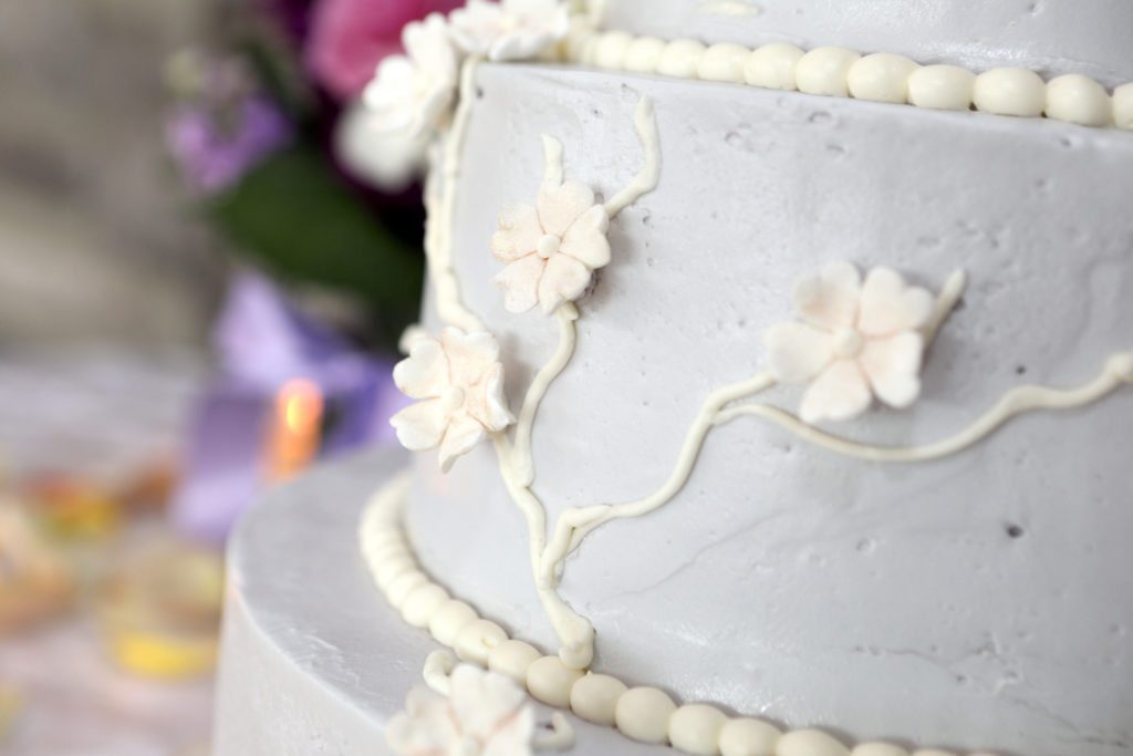 Wedding cake detail white flowers.