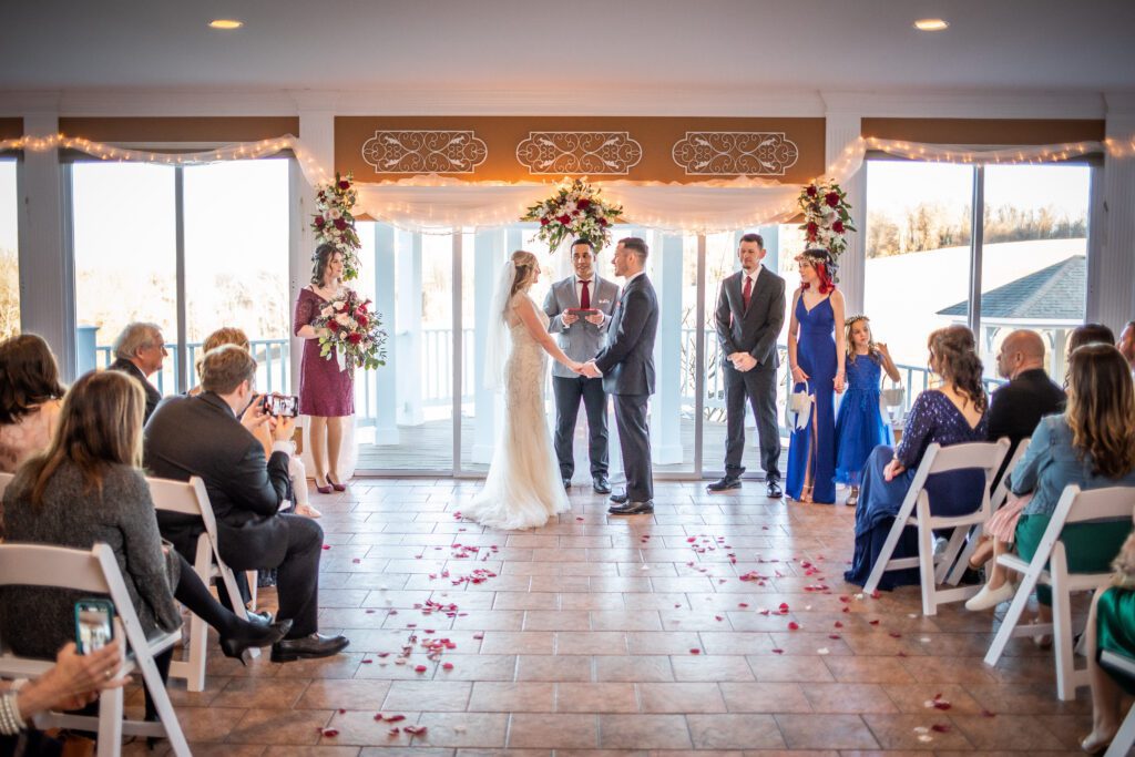 Shannon and Cecil's classic winter wedding indoor ceremony.