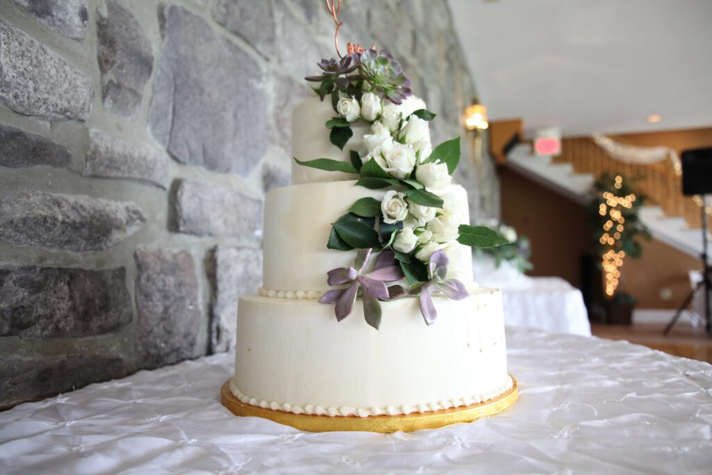 wedding cake with white floral decor